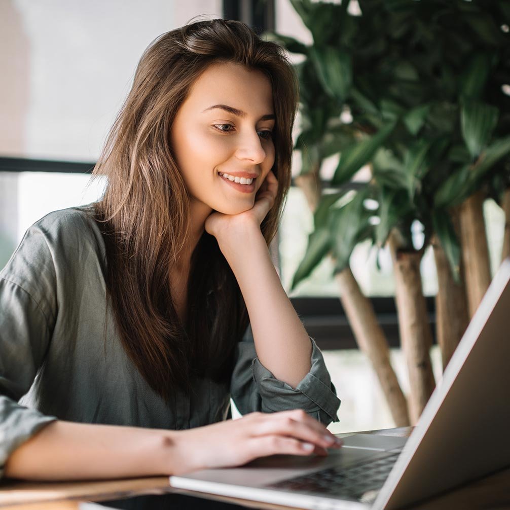 woman looking at computer