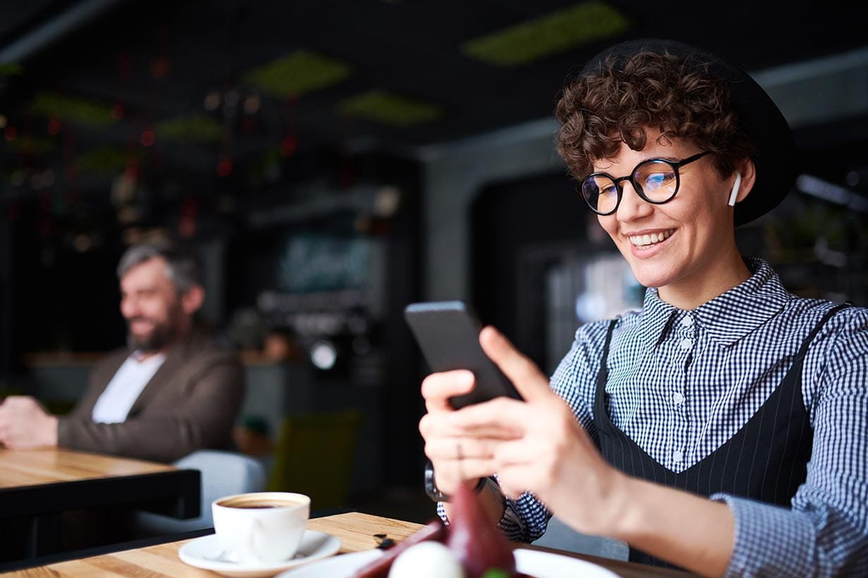 Woman on phone with headphones